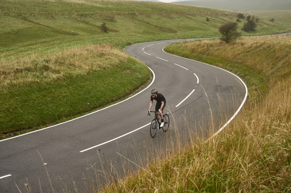 Cyclist Wearing His Team Orro Kit Cycling on His Orro Bike on Beachy Head